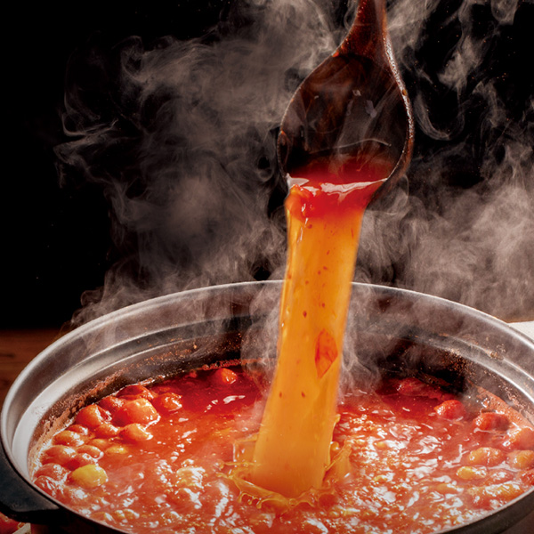 Old Kaili Guizhou red sour soup – bright amber, fermented wild tomatoes