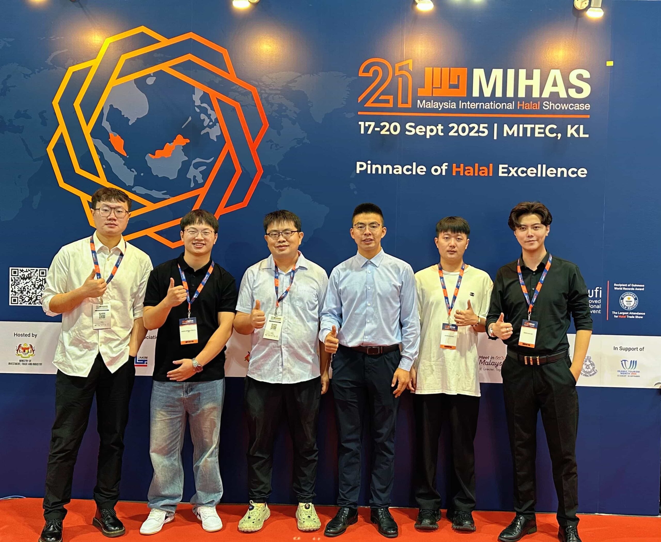 Guizhou Lvyin Food booth at Malaysia Halal Food Expo 2025 showcasing sour soup and chili products